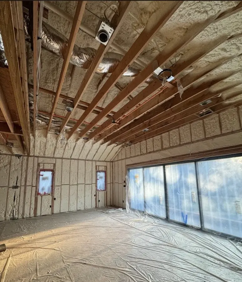 Interior walls and ceiling insulated with spray foam during new construction in Bowleys Quarters